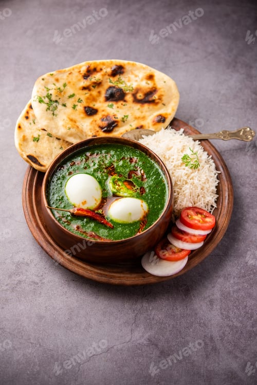 Preview: Spinach egg curry is an Indian non vegetarian dish made using palak gravy with eggs