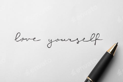 Preview: Written words LOVE YOURSELF and pen on white background, top view