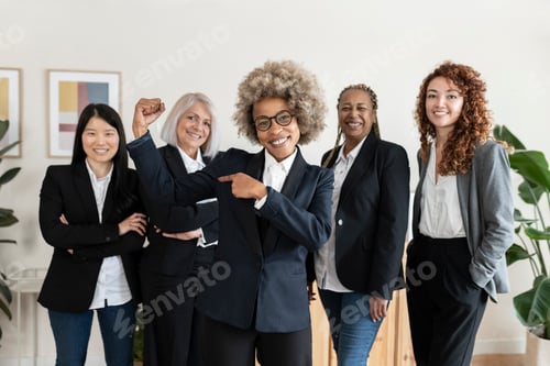 Preview: Group of business women working together as a team empowered woman