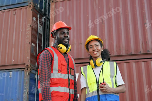 Preview: Foreman control loading Containers box from Cargo freight ship for import export.