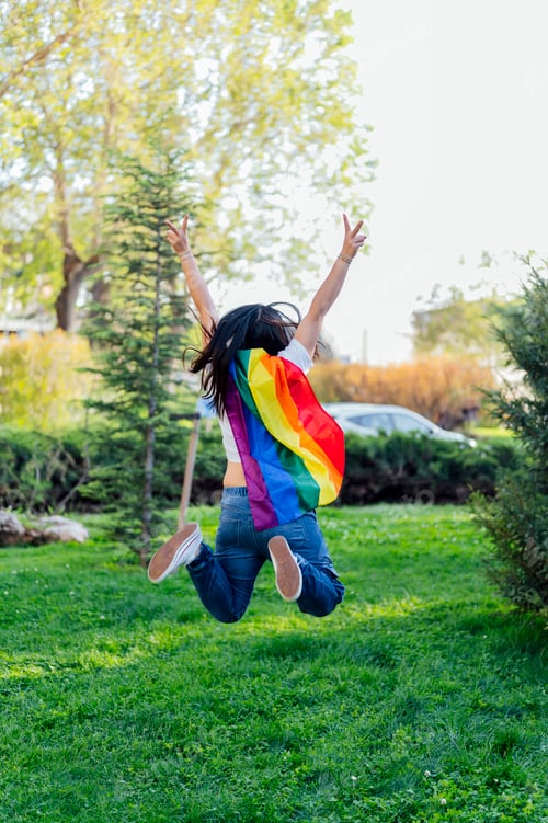 Preview: Back woman with LGBT flag