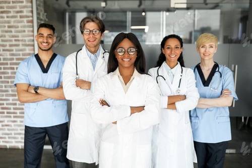 Preview: Multiracial team of newest modern clinic having morning breefing