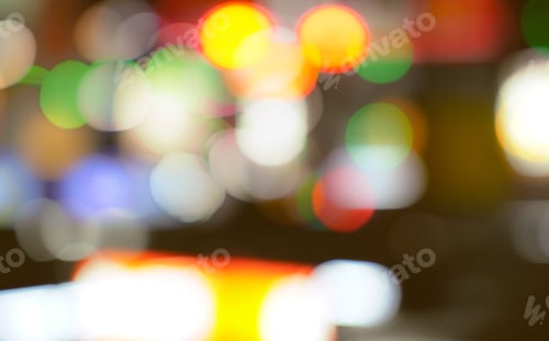 Preview: Blurred bokeh background. Abstract and blurry lights create a festive atmosphere with bright