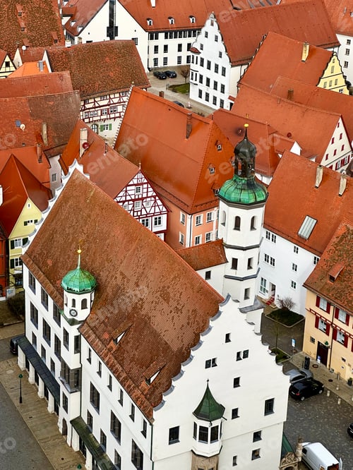 Preview: Bright Geometric Pattern From Town Roofs With Orange Red Colored Shingle In Nordlingen Germany