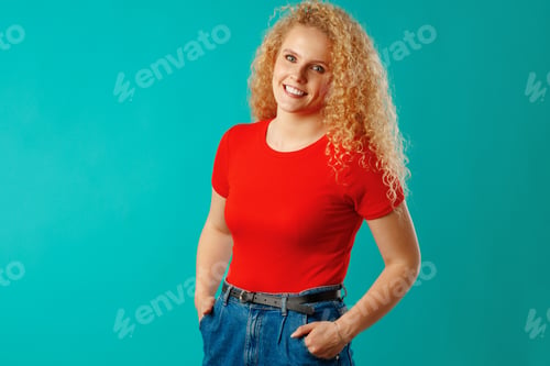 Preview: Close up portrait of a nice young woman with long curly hair