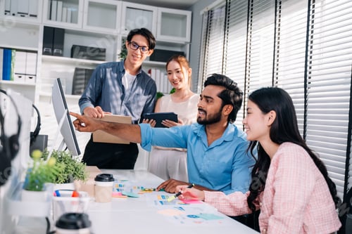 Preview: Group of business people working together at modern office