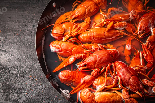 Preview: Boiled crayfish in a pot with hot steam.