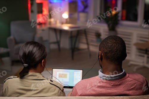 Preview: Couple watching movie on laptop