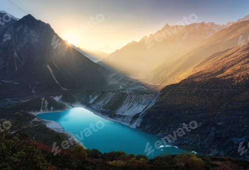 Preview: Mountain valley and lake with turquoise water at sunrise in Nepa