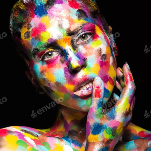 Preview: Girl with colored face painted. Art beauty image.