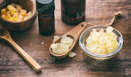 Preview: Chios mastic tears on wooden background, closeup view