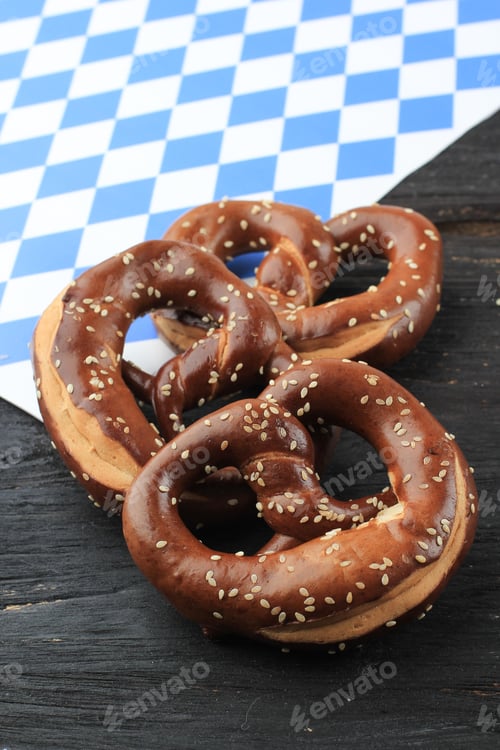 Preview: Bavarian Pretzels Background for Oktoberfest on Wooden Table