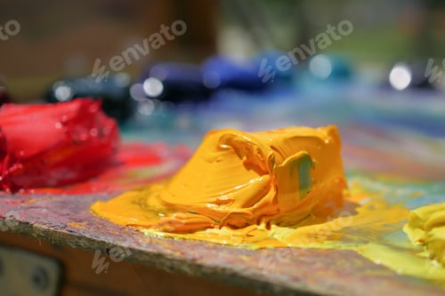 Preview: Colorful palette with oil painting and brushes