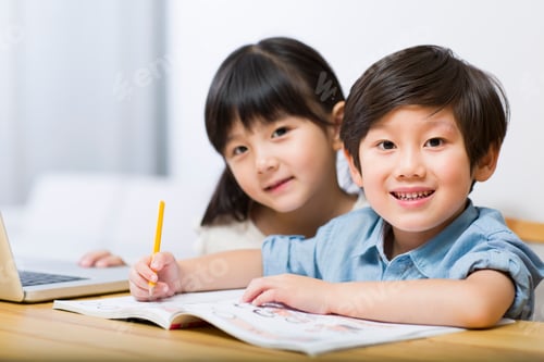 Preview: Little boy and girl doing homework