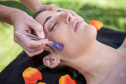 Preview: Woman in spa environment, having facial treatment