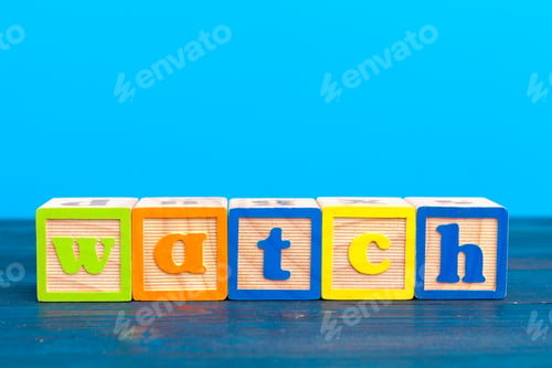 Preview: cube wooden block with alphabet building the word watch