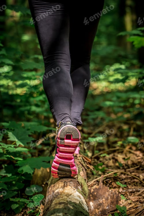 Preview: sporty girl in the woods, warming up before Jogging, sport