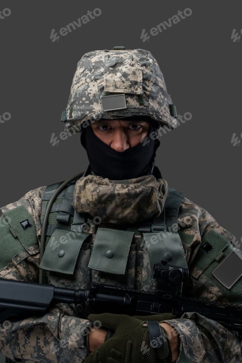 Preview: Shot of serious soldier from ukraine looking at camera