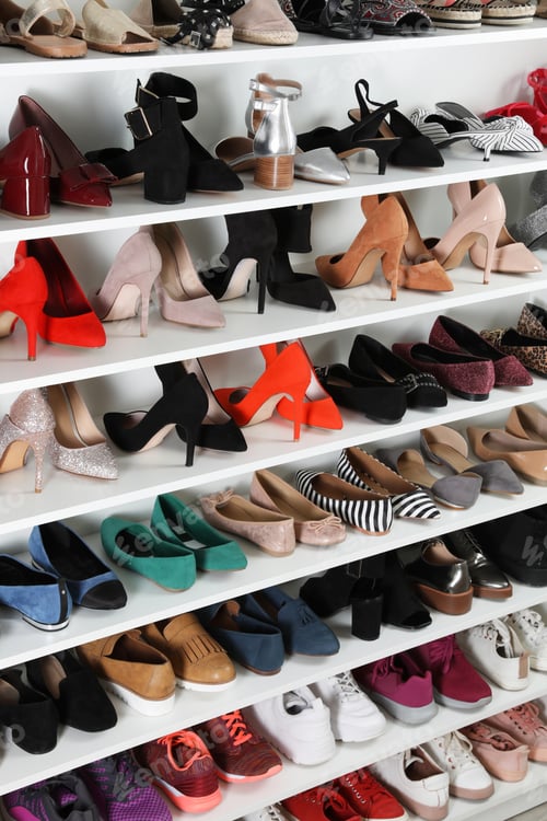 Preview: Shelving unit with different shoes. Element of dressing room interior