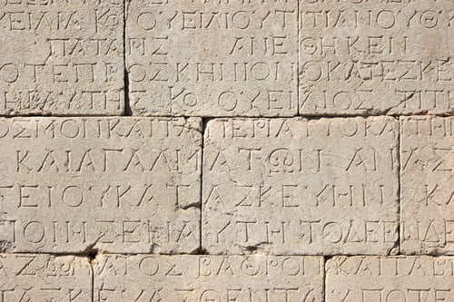 Preview: Old Medieval inscription carved on stone.