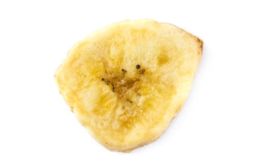 Preview: Dried banana chip isolated on white background showing its texture