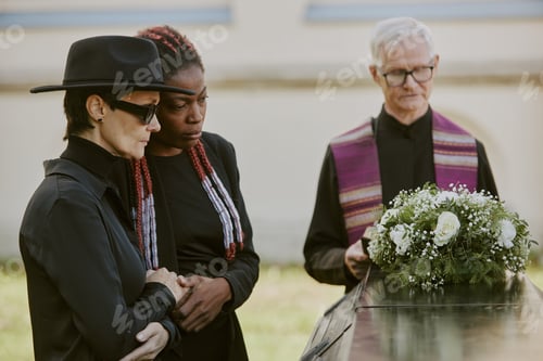 Preview: Mom and Daughter Crying at Cemetery