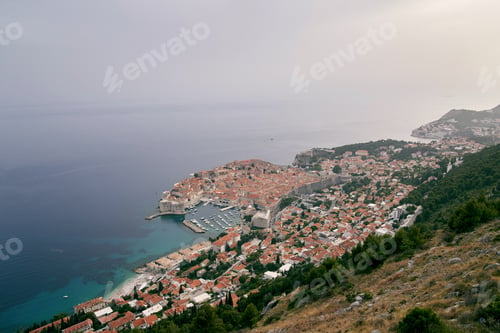 Preview: View from the mountain to Dubrovnik on the seashore. Croatia