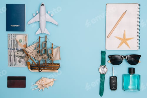 Preview: top view travel concept with retro camera films, smartphone, map, passport