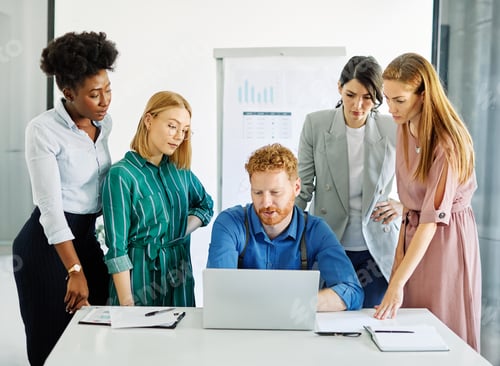 Preview: Young people having a meeting in the office
