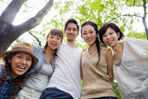 Preview: Group of friends at an outdoor party in a forest.