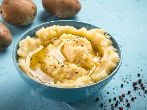 Preview: Mashed potatoes on blue concrete background