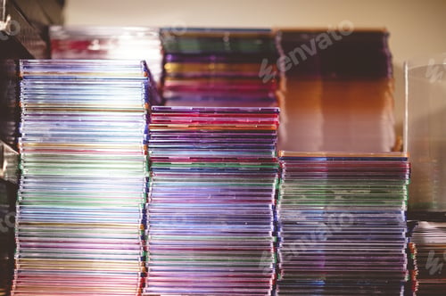 Preview: Closeup shot of a stack of CDs on a blurred background