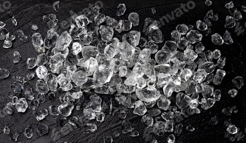 Preview: Pile of crushed ice on black stone background