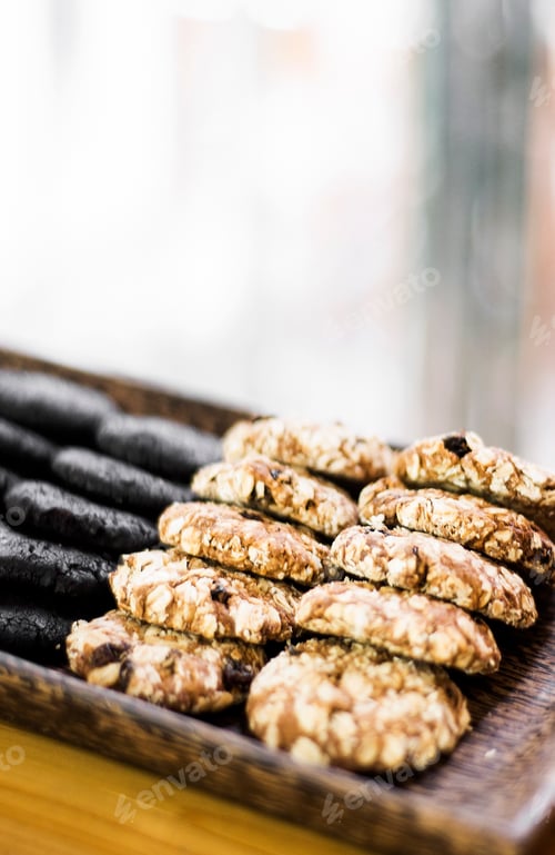 Preview: mixed fresh organic biscuit cookies in bakery display