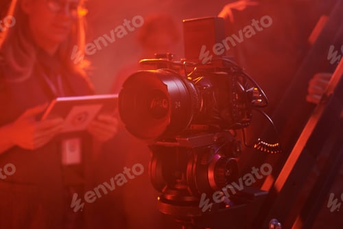 Preview: Background image of pro videocamera equipment in red light