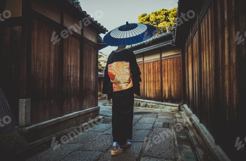 Preview: Beautiful japanese senior woman walking in the village. Typical japanese traditional lifestyle