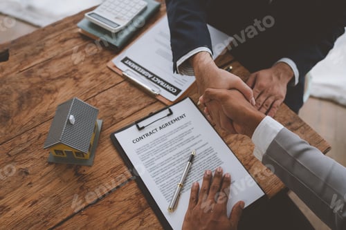 Preview: Handshake of real estate brokers with customers or investors, mortgage loan agreements Make a lease-