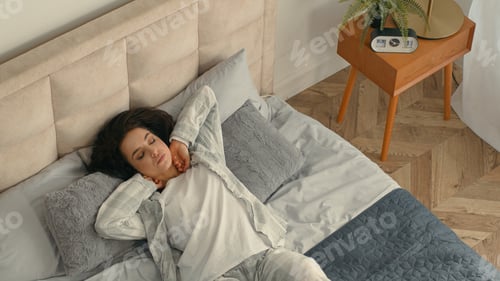 Preview: Top view woman fall on bed lying lazy weekend girl female bedroom home rest relax tired sleep
