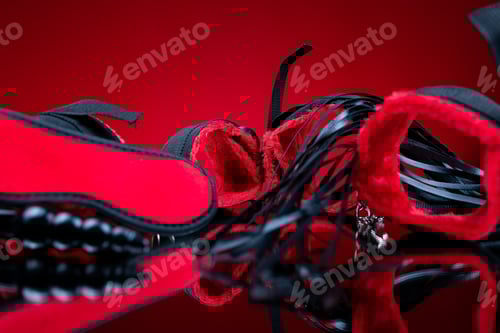 Preview: erotic bdsm toys for intimate sex games set handcuffs next to adult toys