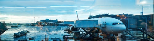 Preview: Everywhere is a just a flight away. Full length shot of an airplane in an airport courtyard.