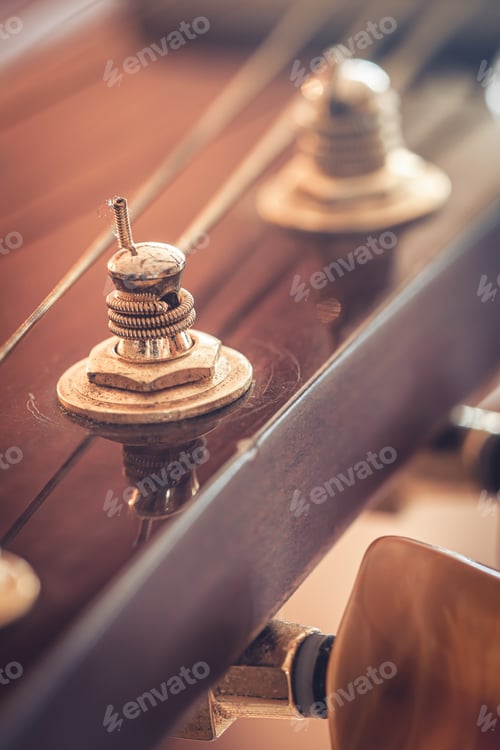 Preview: Strings on a classical acoustic guitar, macro shot.