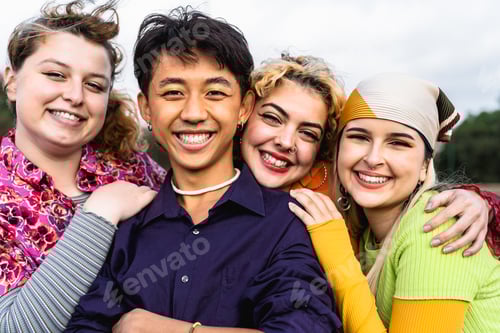 Preview: Happy young diverse friends having fun hanging out together