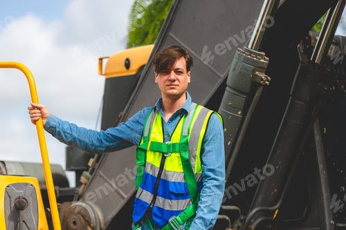 Preview: Construction worker person with backhoe loader or industry tractor, professional technician
