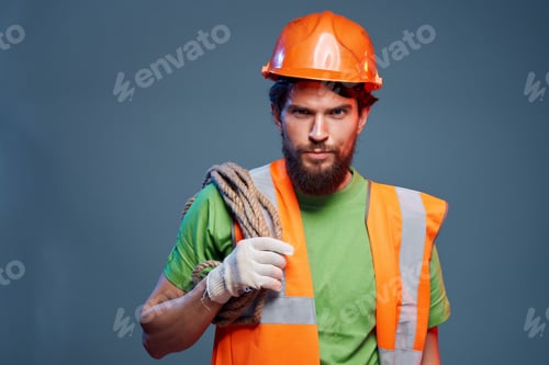 Preview: male builder orange helmet on the head industry isolated background