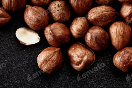 Preview: Close up of Hazelnut kernels - Food Frame Background, macro detailed close up.