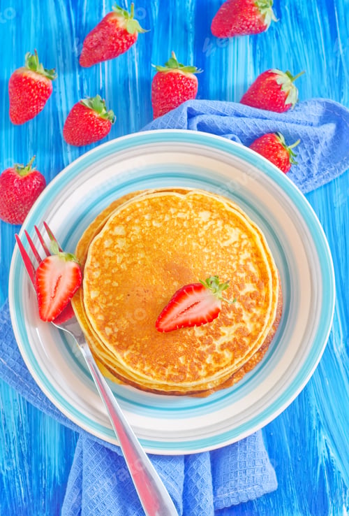 Preview: pancakes on plate and fresh strawberries