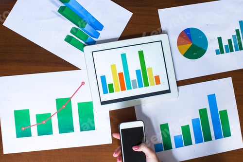 Preview: Business chart showing financial success on paper