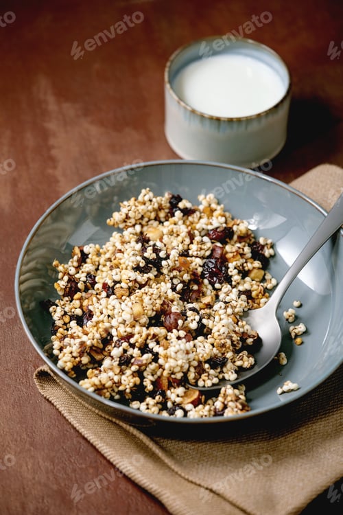 Preview: Bowl of Granola with Spoon and Milk