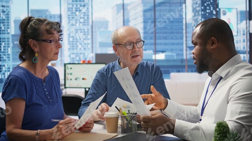 Preview: Senior people discussing a pension financial strategy with broker