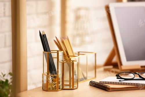 Preview: Gold accessories for interior design on table in room